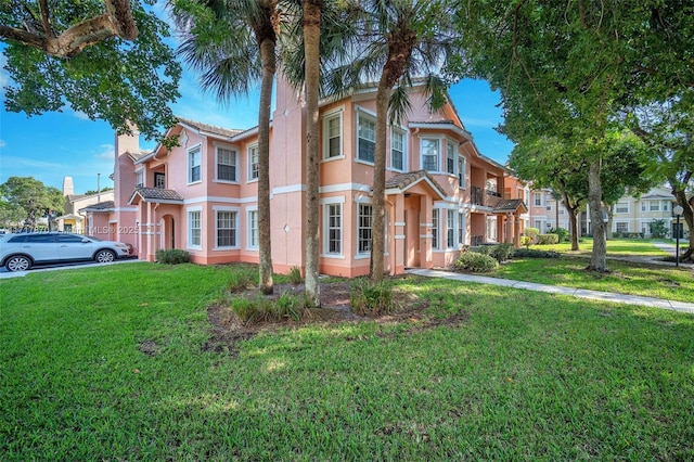 view of front of home with a front yard