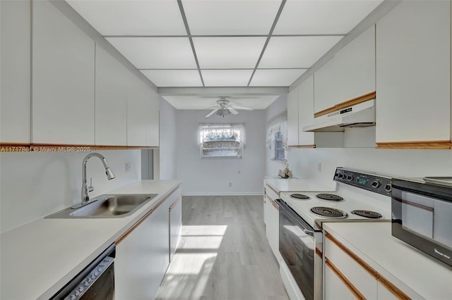 kitchen with white cabinets, white range with electric cooktop, sink, ventilation hood, and light wood-type flooring