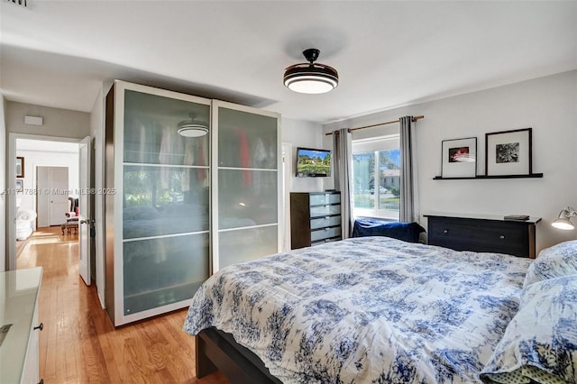 bedroom featuring light hardwood / wood-style floors