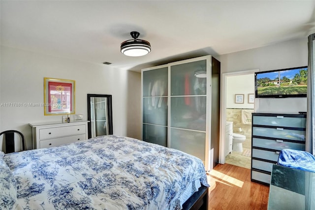 bedroom featuring light hardwood / wood-style floors