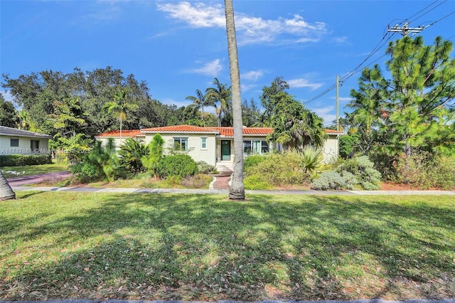 view of front of home with a front yard