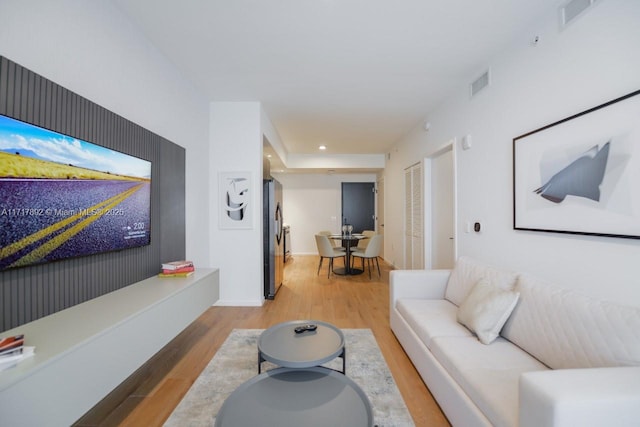 398 NE 5th St Unit 2810, Miami, FL 33132 - living room featuring light wood-style floors and recessed lighting