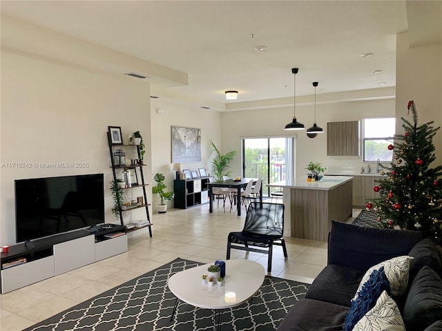 living room featuring light tile patterned floors