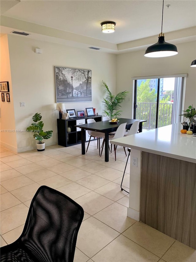 dining room featuring light tile patterned flooring