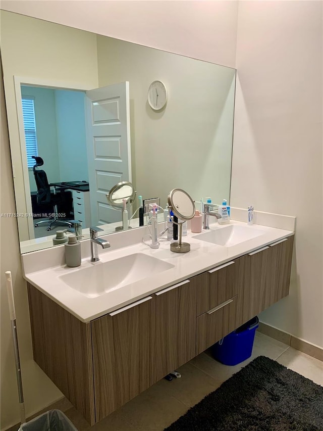 bathroom with tile patterned flooring and vanity