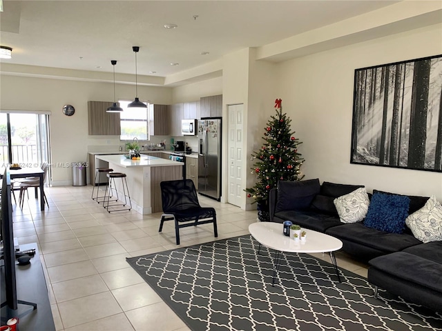 living room featuring light tile patterned floors