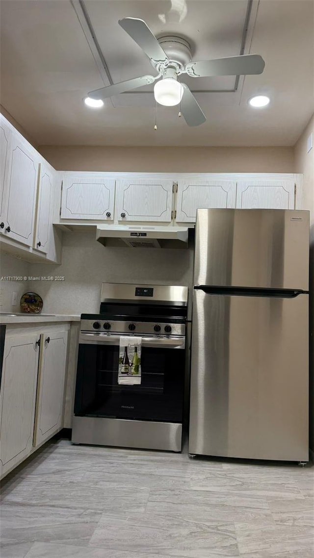 kitchen with ceiling fan, white cabinetry, and appliances with stainless steel finishes