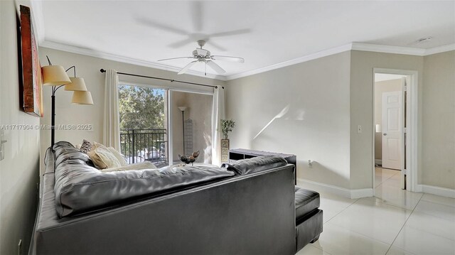 living room with ceiling fan, light tile patterned flooring, and crown molding