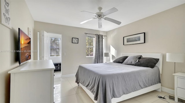 bedroom with light tile patterned floors and ceiling fan