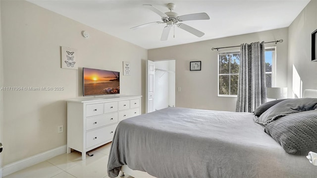 bedroom featuring ceiling fan and light tile patterned flooring