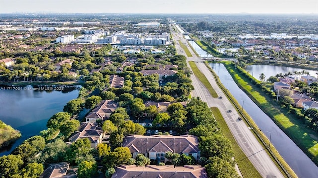 drone / aerial view with a water view