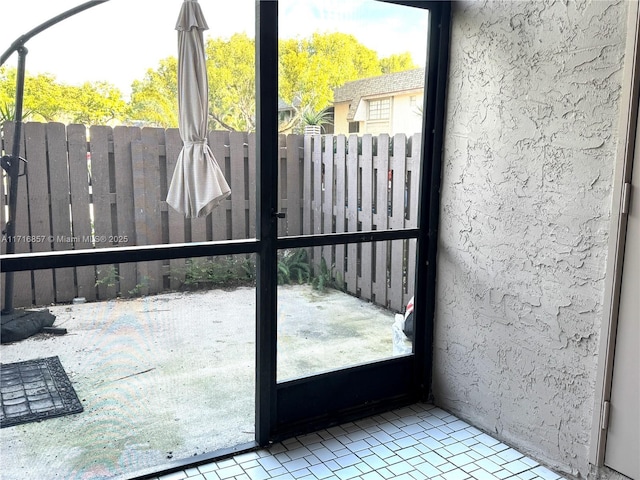 doorway featuring tile patterned floors