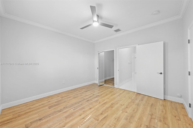 unfurnished bedroom featuring ceiling fan, light hardwood / wood-style floors, crown molding, and a closet