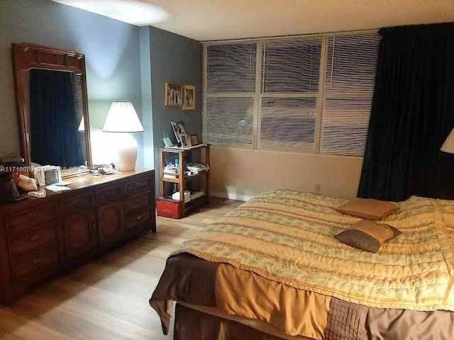 bedroom featuring light hardwood / wood-style flooring