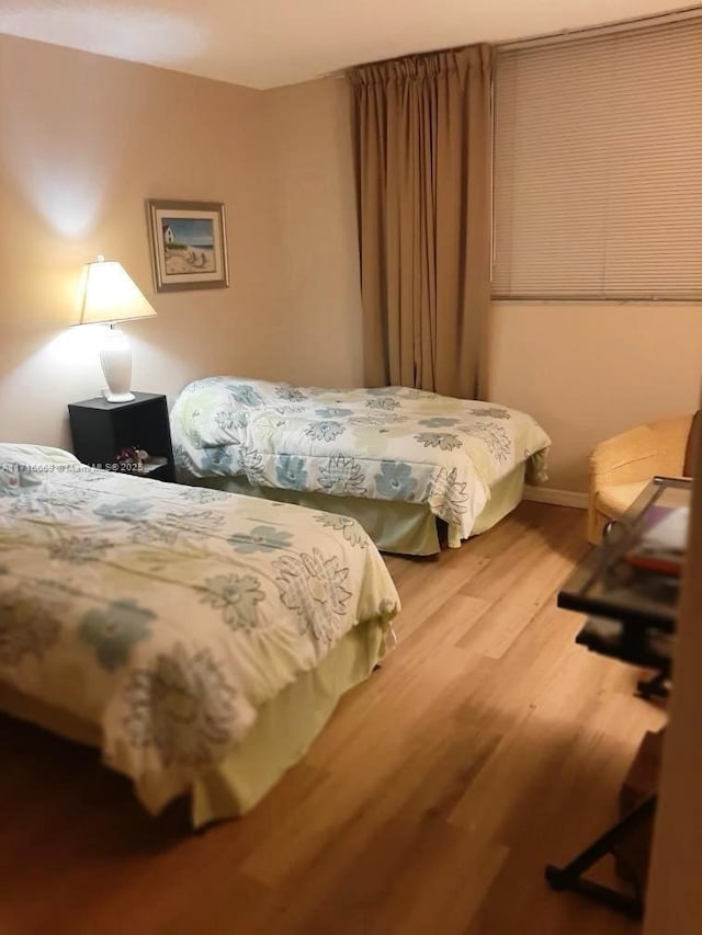 bedroom featuring hardwood / wood-style flooring