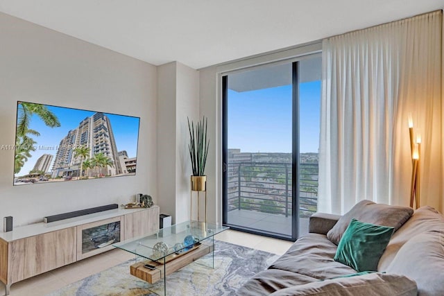 tiled living room with a wall of windows