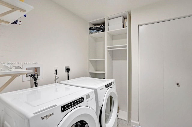 washroom with separate washer and dryer