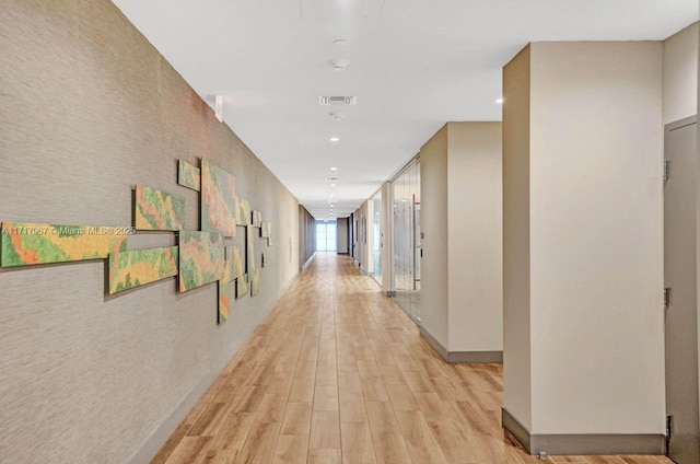 hallway featuring light wood-type flooring