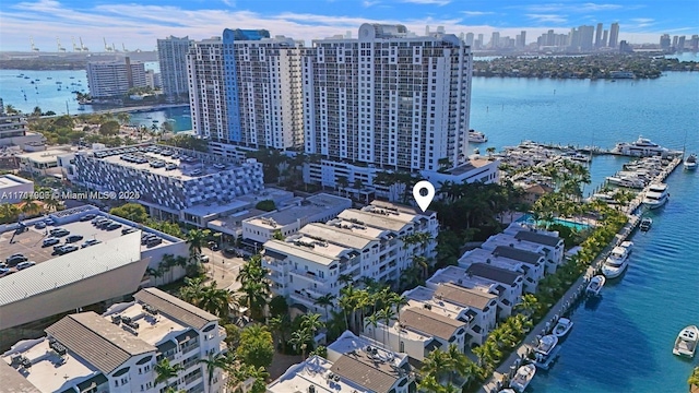 birds eye view of property featuring a water view