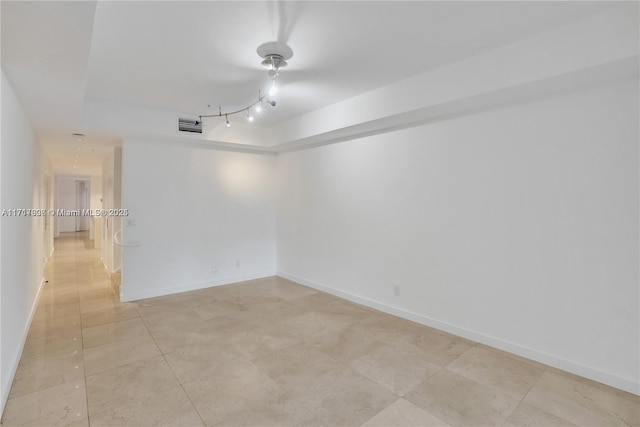 empty room with light tile patterned floors