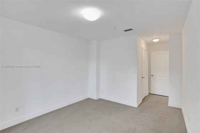 empty room with light carpet