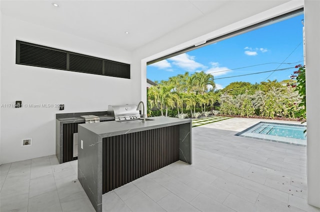 view of patio featuring area for grilling