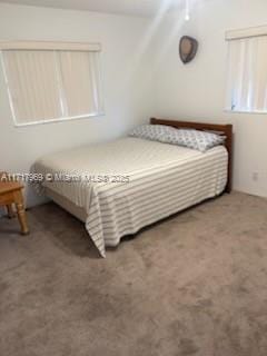 bedroom featuring carpet floors