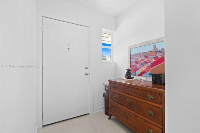 view of tiled foyer entrance