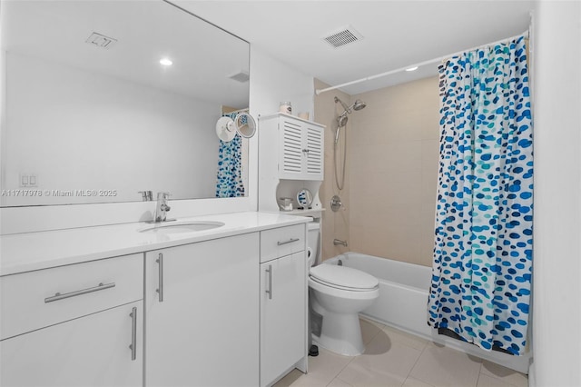 full bathroom with tile patterned flooring, vanity, toilet, and shower / tub combo with curtain