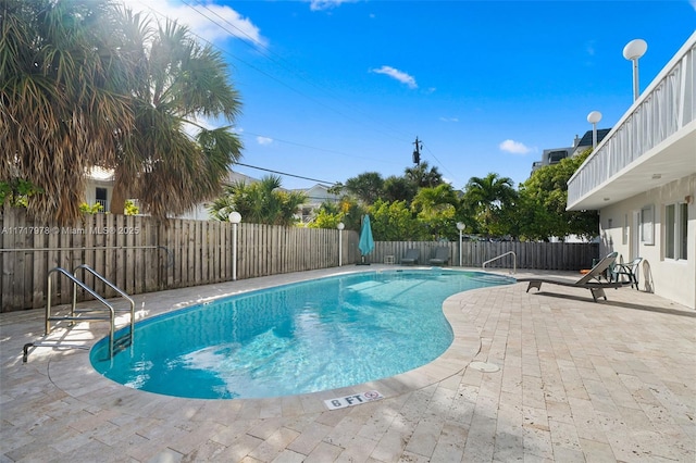 view of pool with a patio area