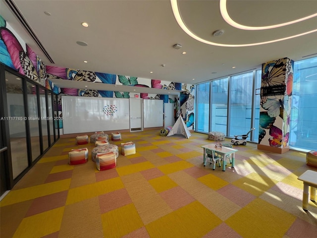 700 NE 26th Ter Unit 2004, Miami, FL 33137 - recreation room featuring expansive windows, carpet floors, and recessed lighting