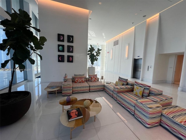 living room with light tile patterned floors