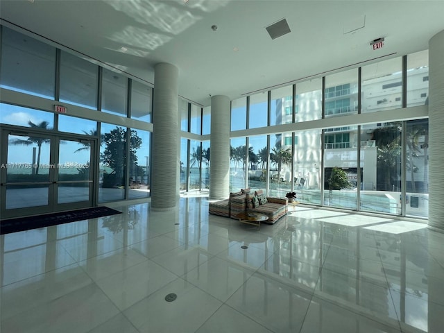 700 NE 26th Ter Unit 2004, Miami, FL 33137 - common area featuring a high ceiling and floor to ceiling windows