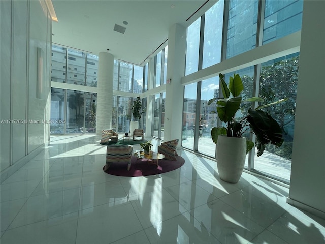 700 NE 26th Ter Unit 2004, Miami, FL 33137 - building lobby with a high ceiling and a wall of windows