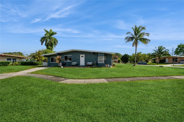 ranch-style home featuring a front yard