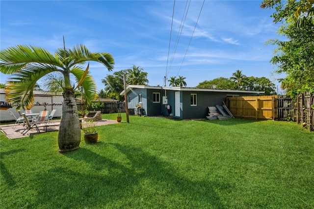 view of yard with a patio area