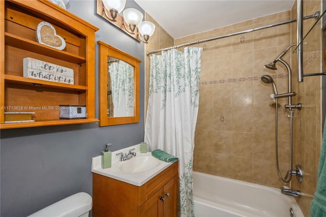 full bathroom featuring vanity, toilet, and shower / bathtub combination with curtain