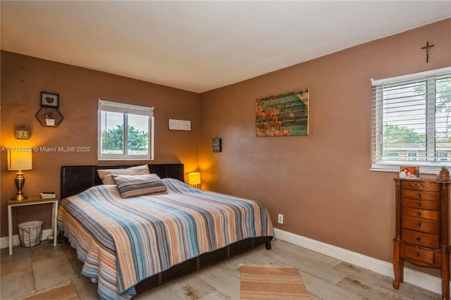 bedroom featuring light wood-type flooring