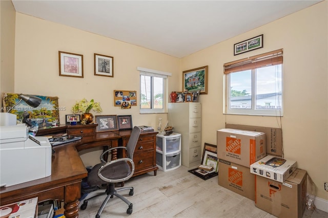 office space with light hardwood / wood-style floors