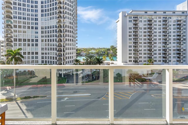 balcony featuring a water view