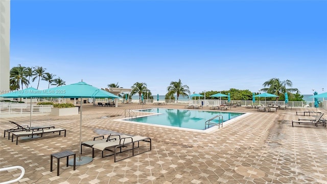 view of swimming pool featuring a patio