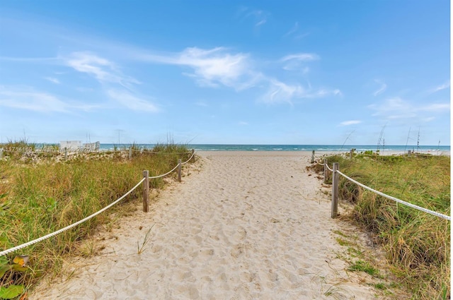 property view of water with a beach view