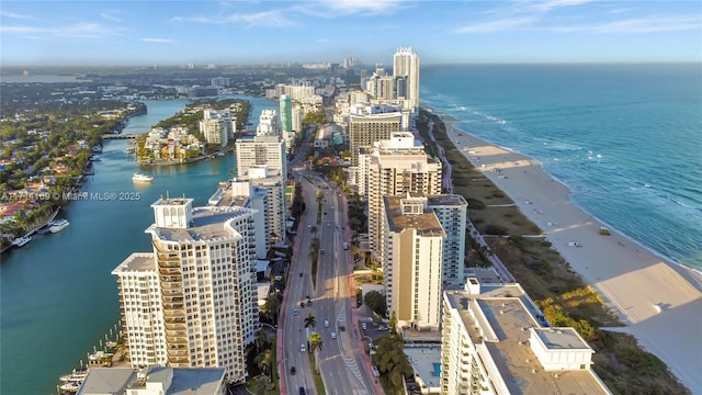 drone / aerial view with a view of the beach and a water view