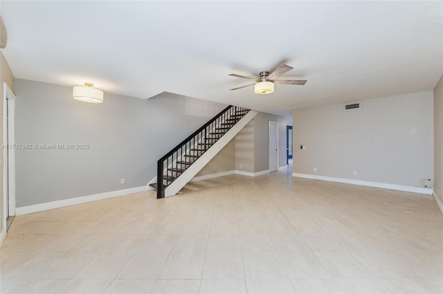 unfurnished room with ceiling fan