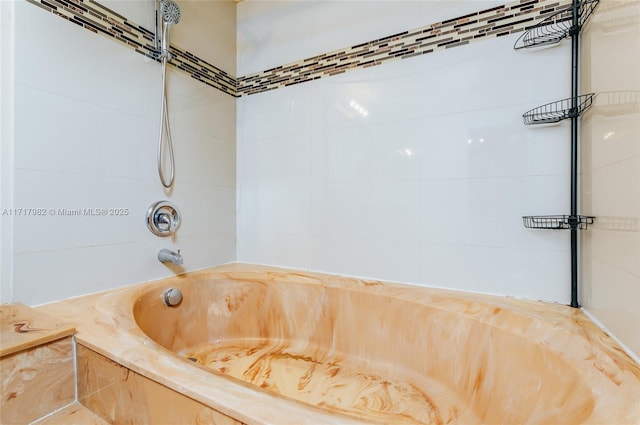 bathroom with shower / bath combination