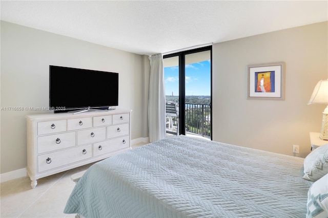 tiled bedroom with access to exterior