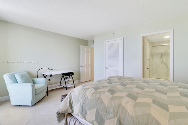 tiled bedroom with a closet