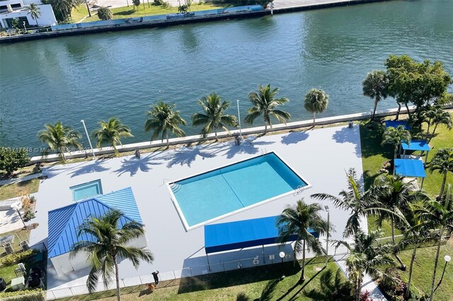 birds eye view of property featuring a water view