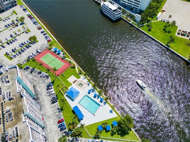 birds eye view of property with a water view