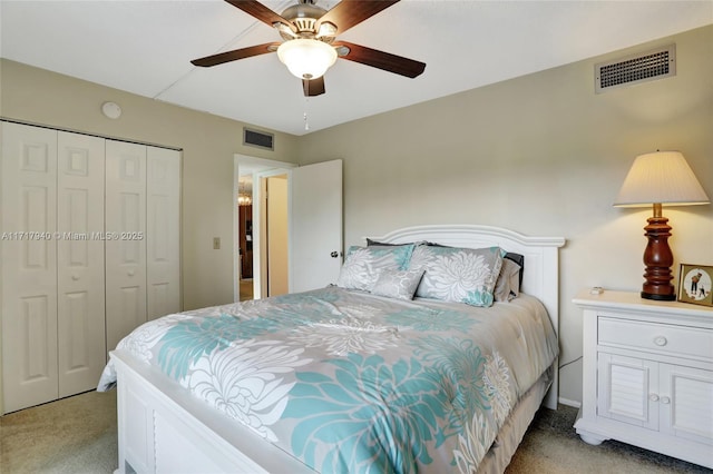 carpeted bedroom with a closet and ceiling fan